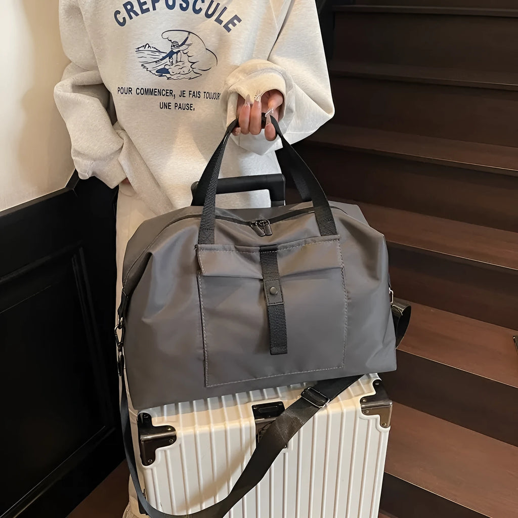 Large capacity one-shoulder travel backpack in Oxford cloth available in black, grey or green