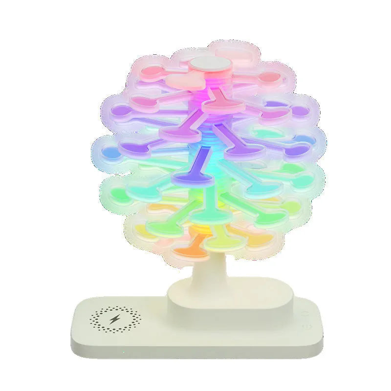 Spiral tree geometric LED table lamp on a table, showing its modern design and compact size.