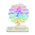 Spiral tree geometric LED table lamp on a table, showing its modern design and compact size.