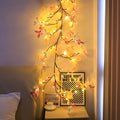 LED butterfly tree rattan lamp with flexible branches and colourised butterfly decorations