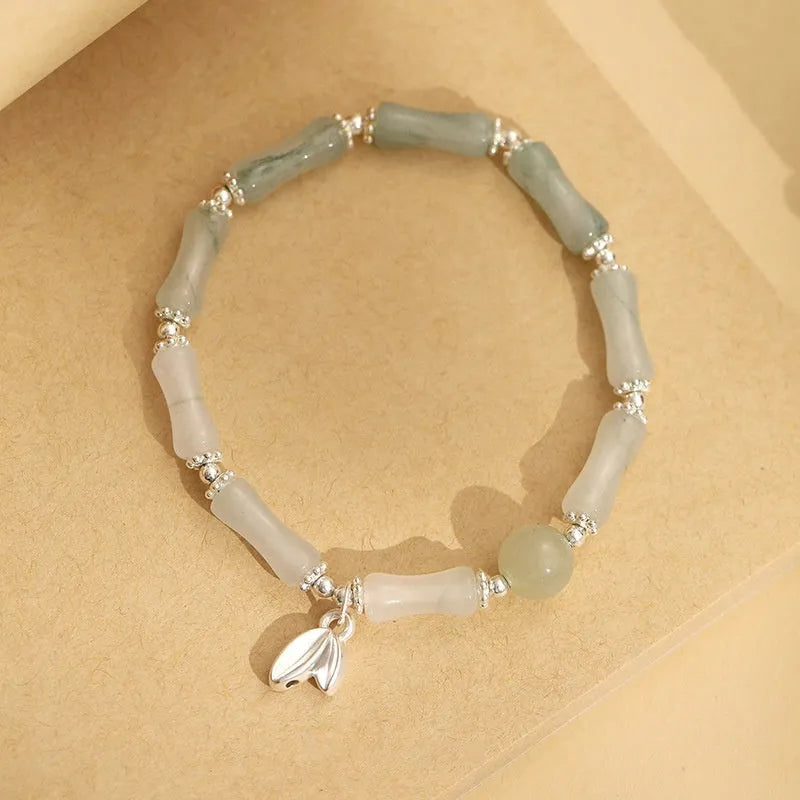 Silver-coloured antique-style bracelet made from natural Tianshan green bamboo with bamboo joint detailing.