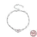Sweet style sterling silver bracelet with small heart pendant on an adjustable chain.