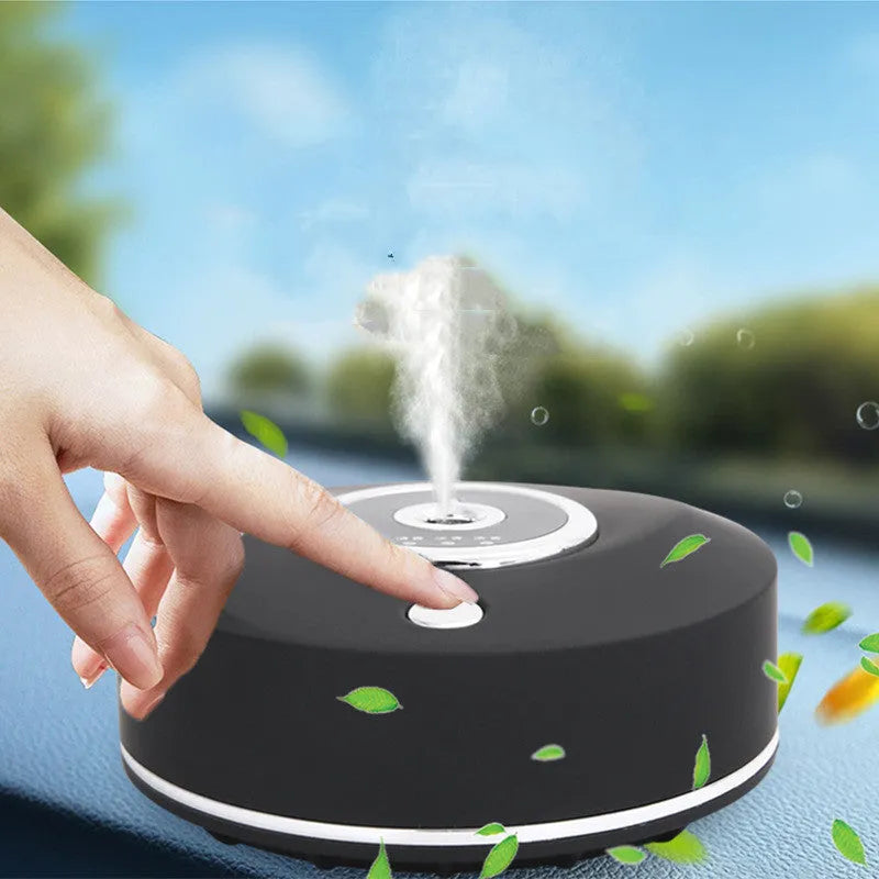 USB-powered car air freshener diffuser in black plastic housing with anti-slip pad.