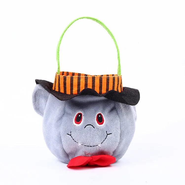 Halloween candy bag with pumpkin design measuring 16cm square in velvet fabric