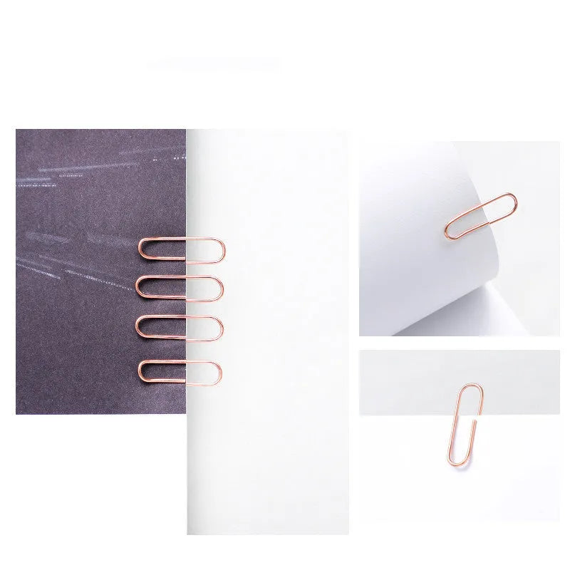 Rose gold heart-shaped metal paper clips in a box, size 28mm.