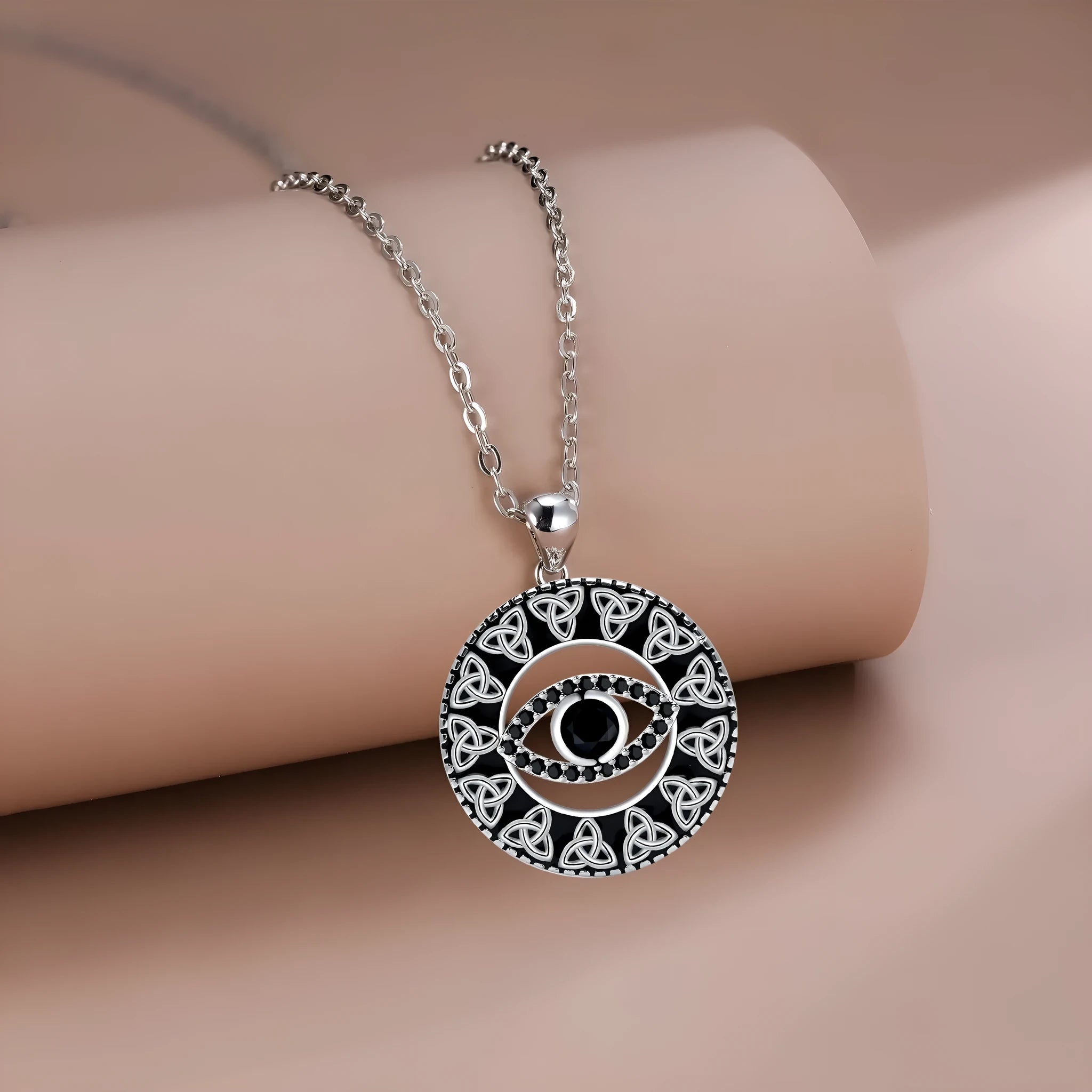 Copper electroplated Devil's Eye pendant necklace with a cross chain for women.