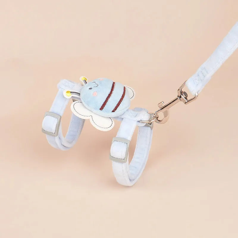 Pink adjustable cat harness with bee-shaped back and matching hand-held leash.