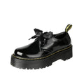 Black thick soled women's lace-up shoes with ribbon and cross strap details on superfine fibre upper