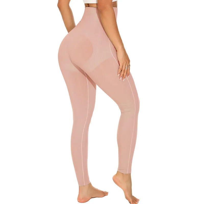Women's belly contracting sports yoga trousers in black with lumbar support and seamless construction