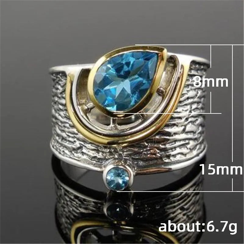 Women's blue zircon inlay ring in creative Chinese style drop shape design on alloy band