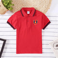 Boy's red short-sleeve cotton t-shirt with a lapel collar in a Korean style.