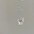 Cat pendant necklace with transparent rhinestones, silver plated water wave chain, white or pink colour option