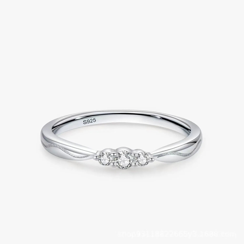 S925 sterling silver ripple wave gang drill ring on white background, white gold plating, US sizes 6-9