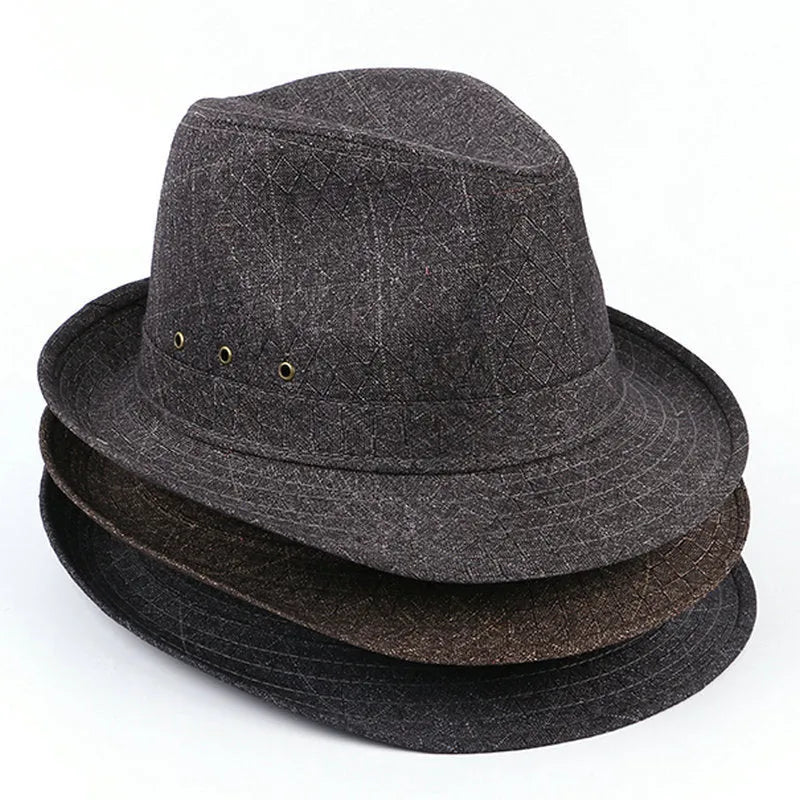 Men's black suit material fedora hat on a stand, showing classic brim shape.