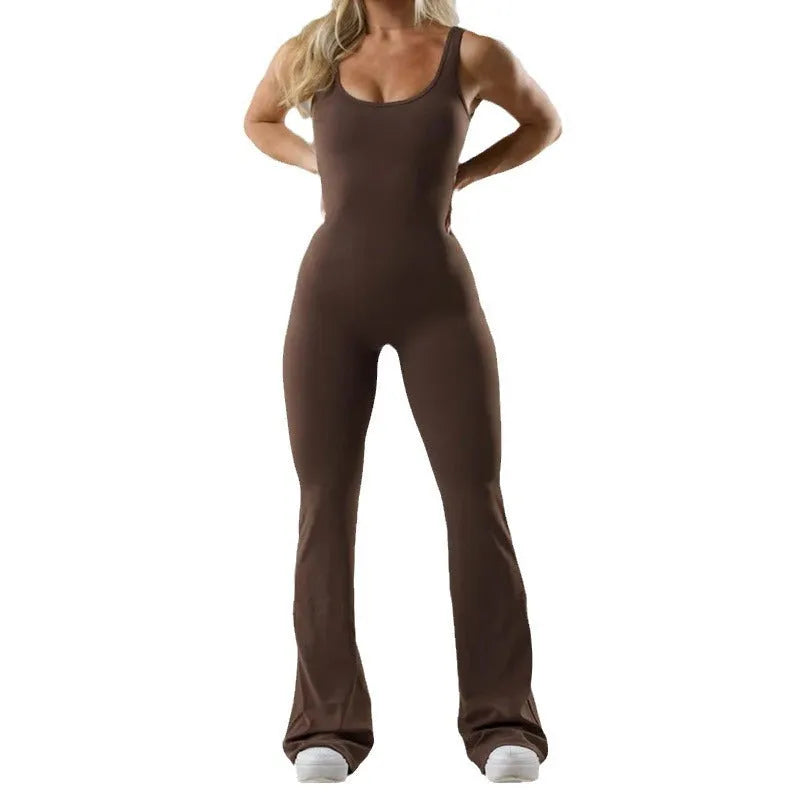Women's black milk silk yoga bodysuit with seamless hollow design and mid waist.