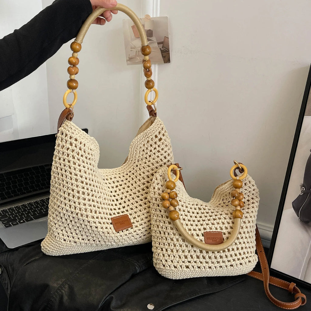 Large knitted tote beach bag with bucket shape and contrast stitching in black or brown colour options