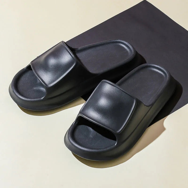 Thickened EVA non-slip slippers in various colours showing the flip-flop design and textured sole.