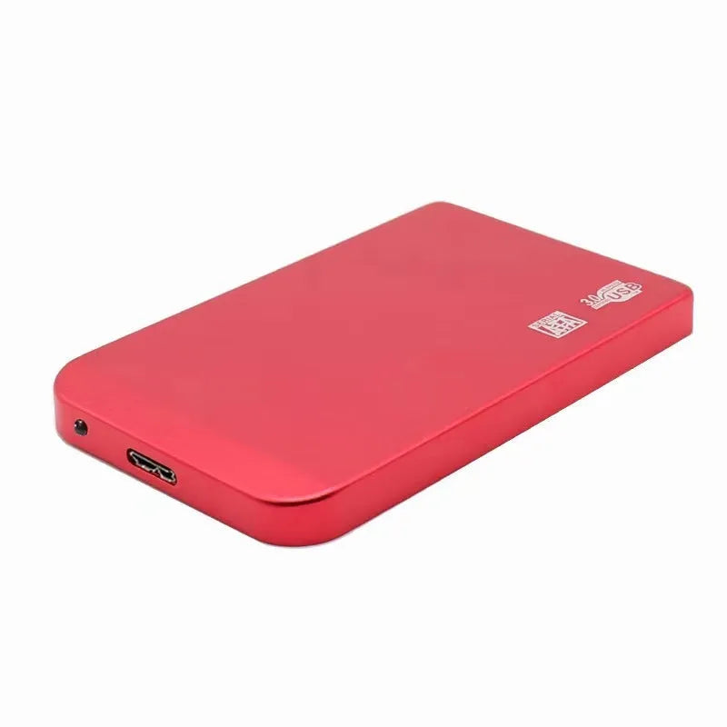 Silver metal external solid state drive with USB 3.0 cable on a desk.