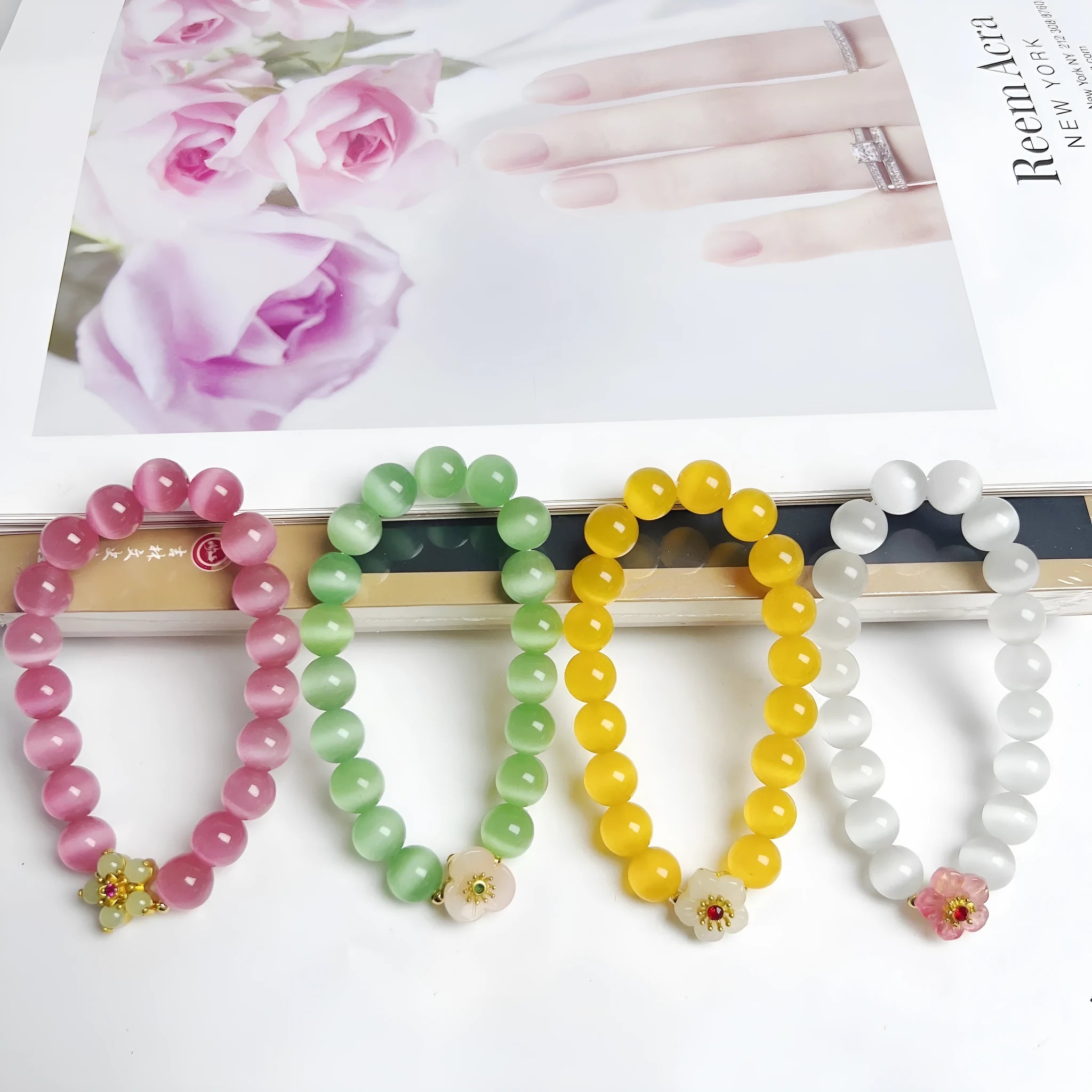 Handmade glass bracelet with floral beads in yellow, pink, white or green colour options