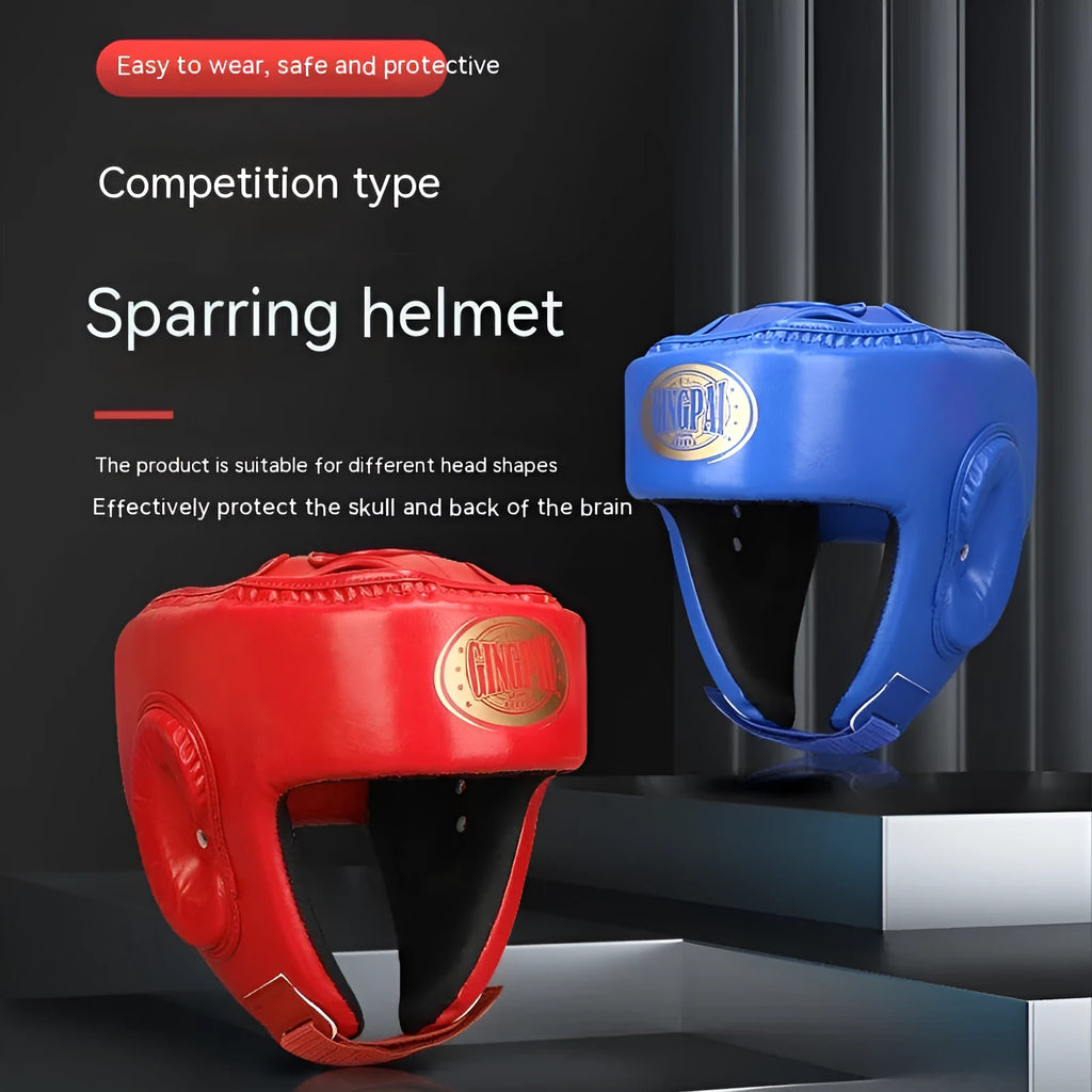 Red fully enclosed boxing helmet with jaw protection on a white background.