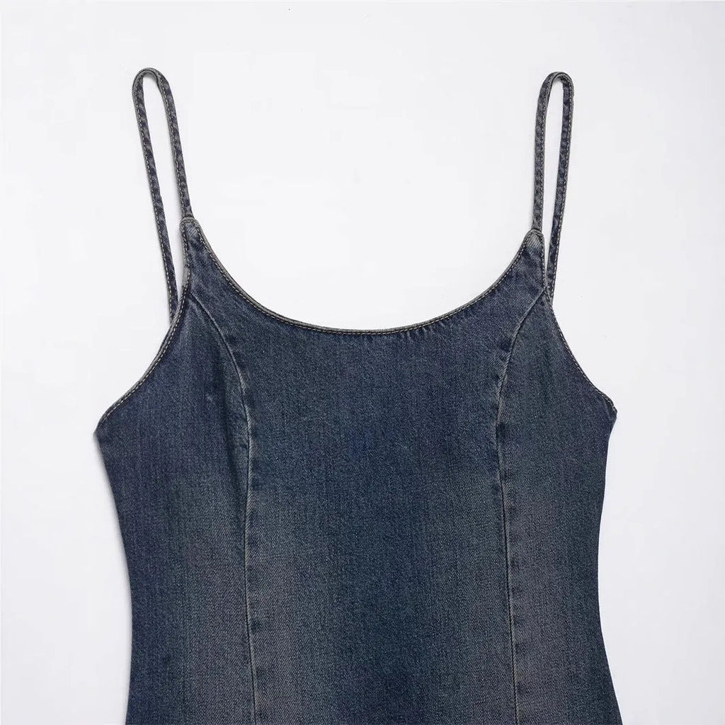 Women's blue wash-effect denim dress with hooded design, pleated short skirt, and asymmetrical hem