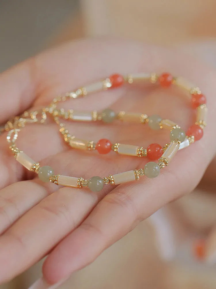 Hetian jade bamboo joint bracelet for women in 6mm size, shown in jade green and South red colour options.