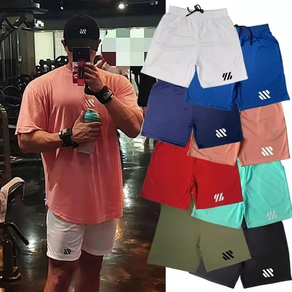Man's loose-fit metal silk sports shorts in army green colour for running.