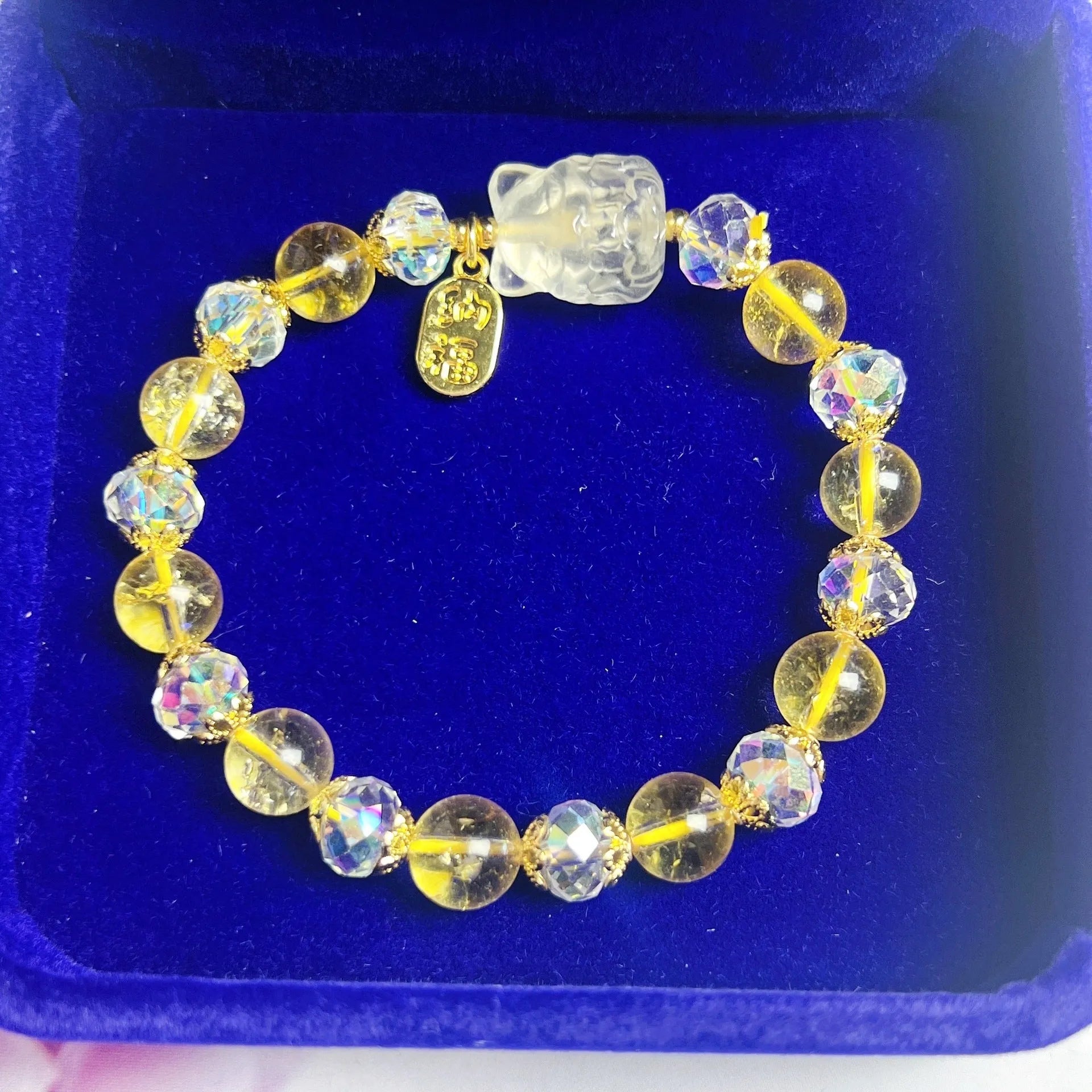 Natural citrine nine-tail fox crystal bracelet for women on a wrist.