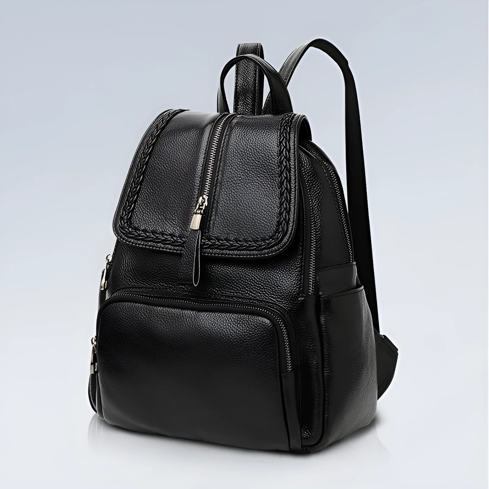Solid colour genuine leather women's backpack showing internal organisation compartments