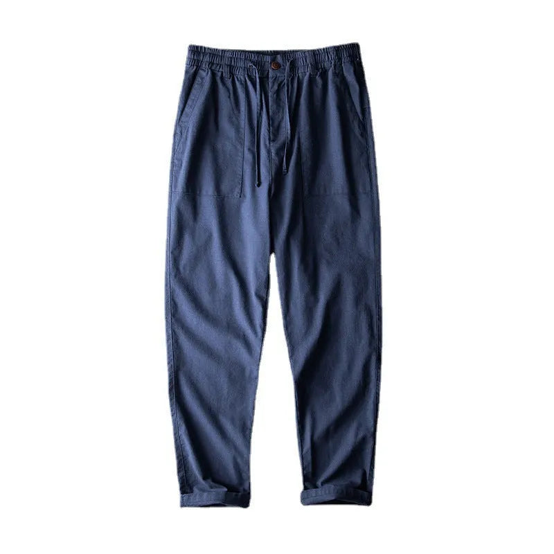Men's linen casual trousers in solid colour with mid waist design available in three colour options
