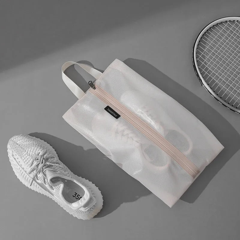 Travel shoes buggy dustproof storage bag in beige, made from TPU protective film, large size 40x22cm.