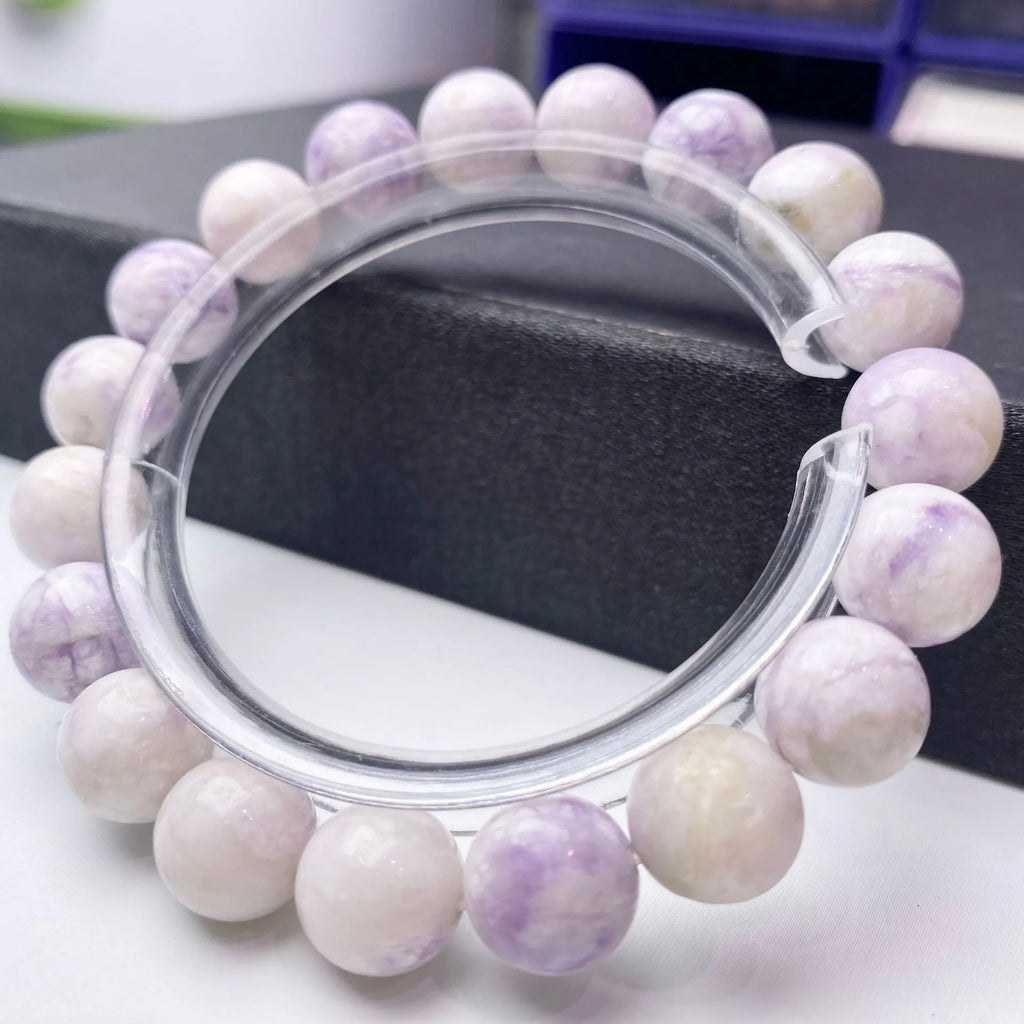 Natural purple turquoise beaded bracelet for women, showing stone colour variation.