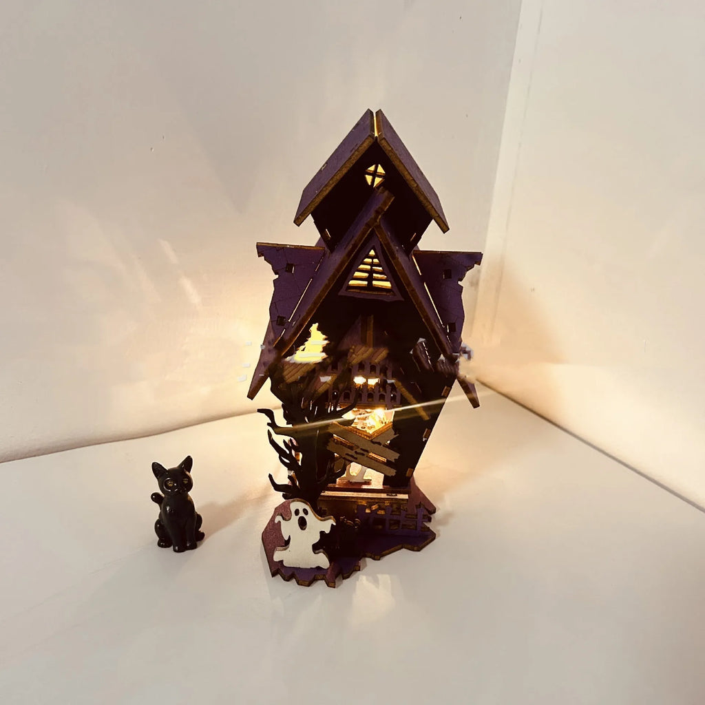 Wooden Halloween haunted house table decoration with candlestick design