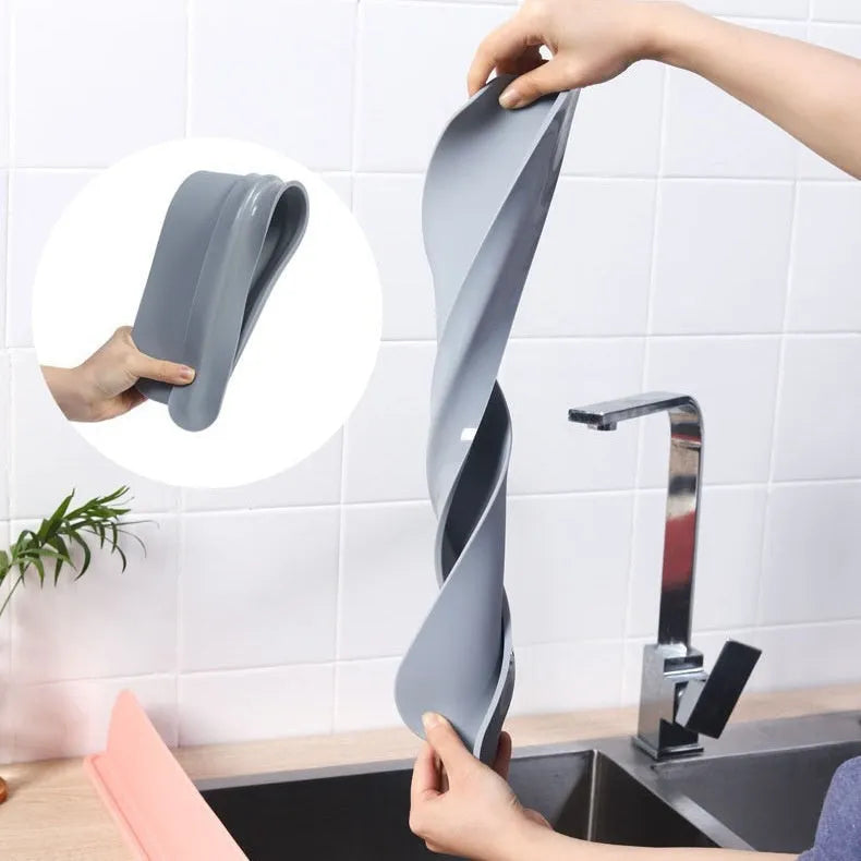 Silicone kitchen sink water blocking plate in grey, blue or black measuring 52mm wide by 85mm long