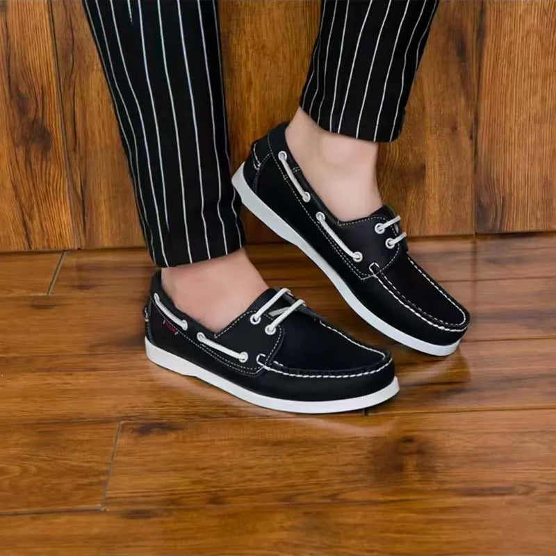 Men's British style casual shoe with round toe and flat heel, shown in a solid colour.