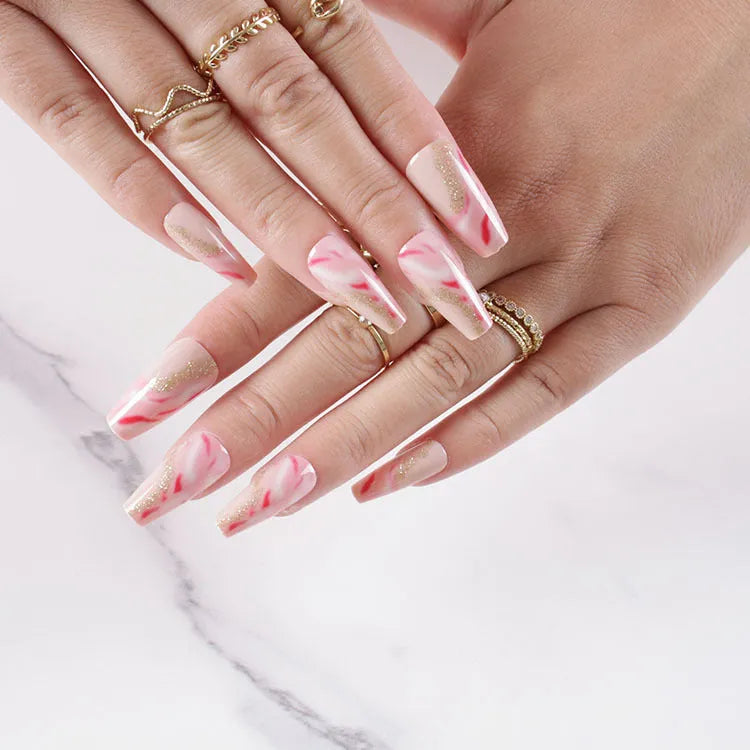 Rose and leopard print press-on false nails kit with glue and jelly adhesive bottles