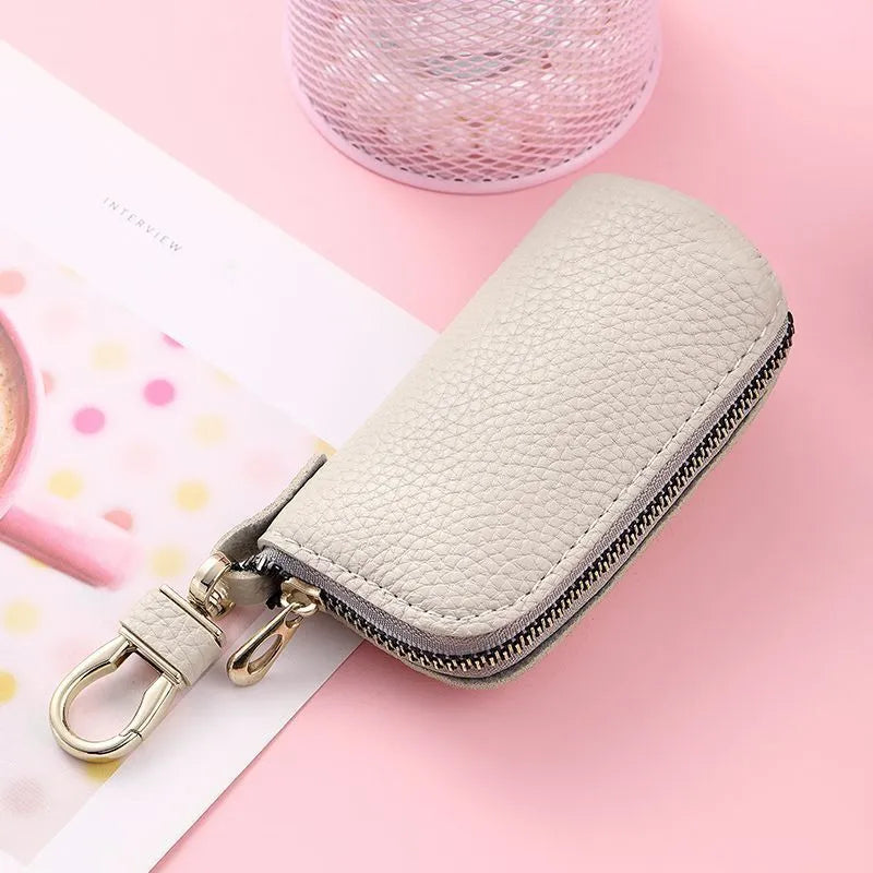 Black waterproof PU key case with zipper closure for organised key storage