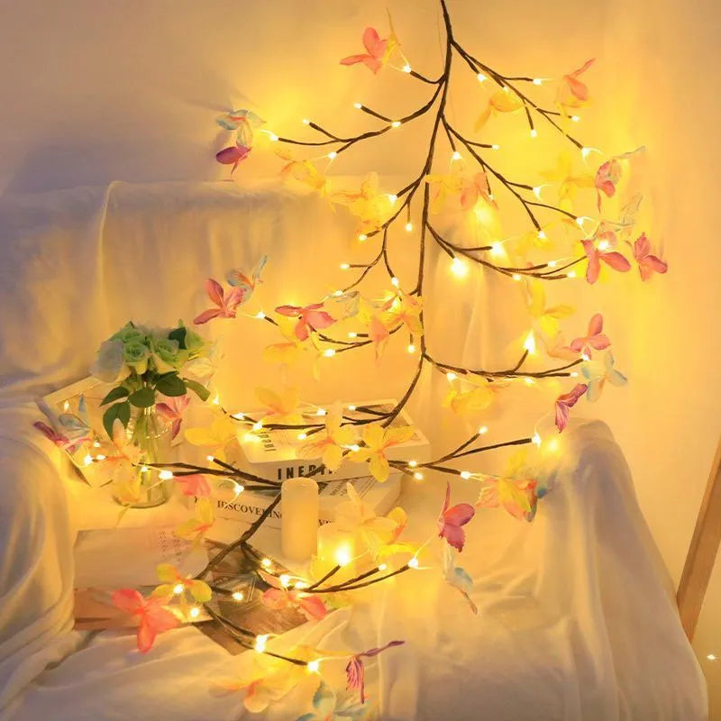 LED butterfly tree rattan lamp with flexible branches and colourised butterfly decorations