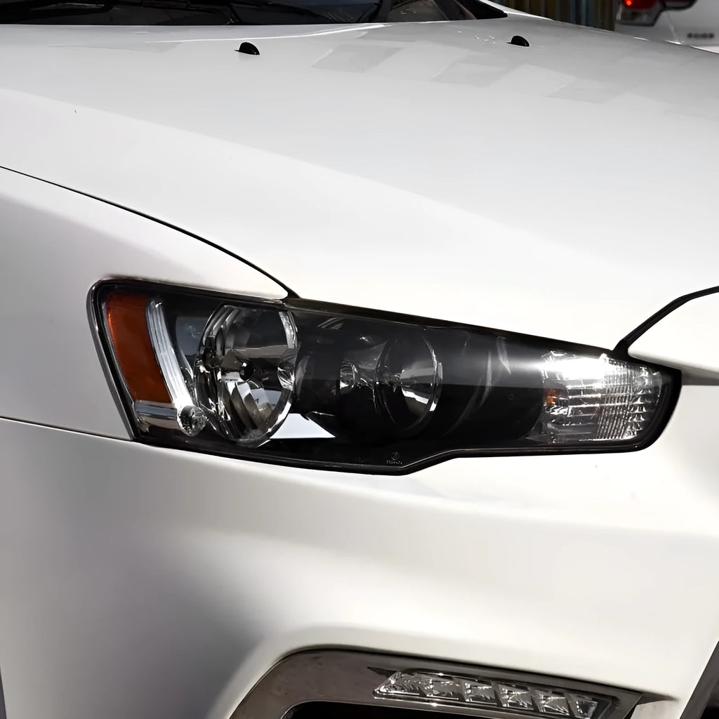Transparent plastic car headlight housing cover showing clear construction and 50x30x20mm dimensions