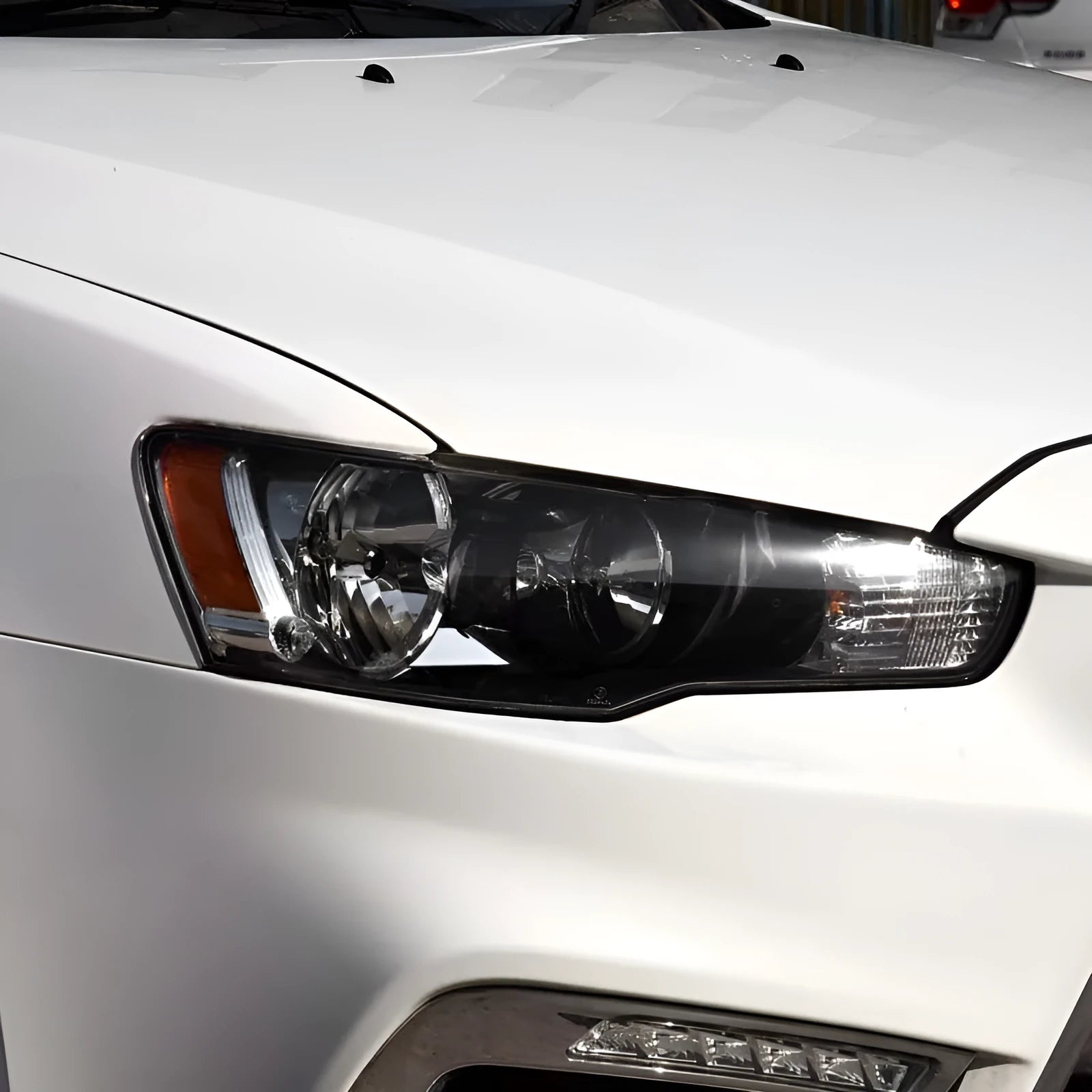 Transparent plastic car headlight housing cover showing clear construction and 50x30x20mm dimensions