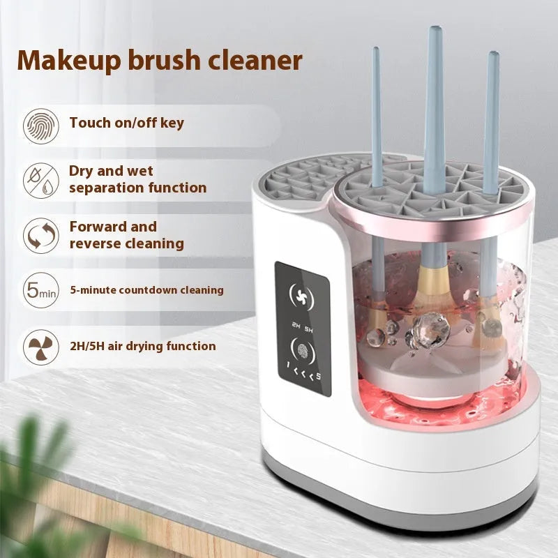 White rechargeable electric makeup brush cleaner with drying chamber on a vanity table.