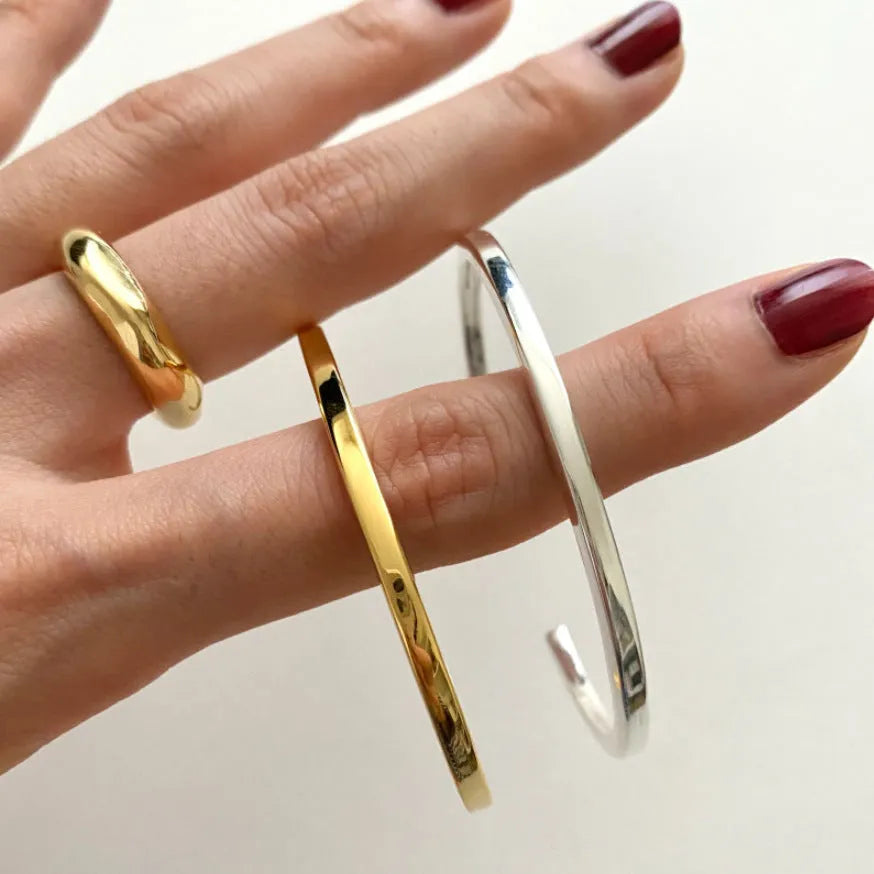 Sterling silver 3mm square line bracelet with electroplated finish on white background