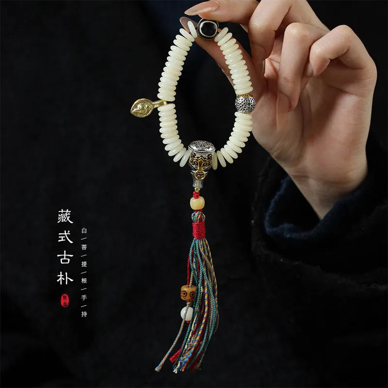Tibetan white bodhi seed Buddhist bracelet or handheld mala with traditional knotting